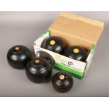 Two sets of Thomas Taylor lawn bowls, No. 2 bias (boxed) and No. 3 bias, along with a vintage turned