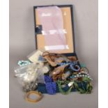 A box of costume jewellery, necklaces, beads, bracelets, earrings etc
