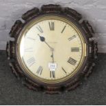A Victorian mahogany cased single fusee wall clock, with carved piecrust bezel and painted dial