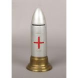 A World War I red cross charity box formed as an artillery shell, 17cm.