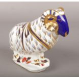 A Royal Crown Derby ceramic figure of a ram, silver stopper. Minor chip to gilding on one horn and