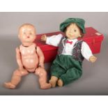 A vintage composite jointed doll, along with a boxed Gloobee doll.