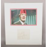 A signed Tommy Cooper display.