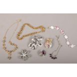 A collection of vintage designer costume jewellery including Butler & Wilson, Christian Dior and