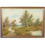 C. Inness framed oil on canvas rural scene