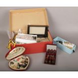 A box of costume jewellery, necklaces, beads, brooches, earrings to include Oriflame set of