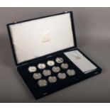 A cased set of 24 royal mint Tonga silver proof two pa'anga golden wedding coin set, all with