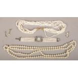 A collection of freshwater pearl jewellery including multi row necklet, bracelet watch and two pairs