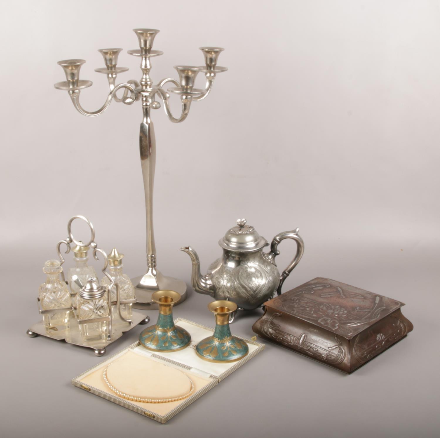 A collection of metalwares, to include candelabra, Crumpsall biscuit tin, simulated pearl necklace