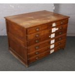 An oak six drawer part plan chest. (87cm x 122cm x 85cm). Generally good condition.