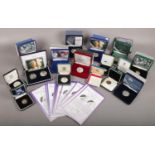 A box of cased Royal Mint silver proof coins to include golden jubilee, diamond wedding examples.