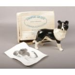 A boxed Coopercraft ceramic figure of a Border Collie dog.