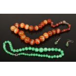 A banded agate bead necklace and a suite of jadeite jewellery comprising beads and pair of earrings.