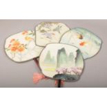A collection of oriental decorative double sided hand fans