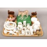 A tray of ceramics to include Beswick donkey, copper luster jugs, crested china etc. Chip to mane of