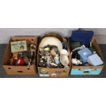 Three boxes of miscellaneous to include wooden figures, collectors spoons, wash jug and bowl etc.