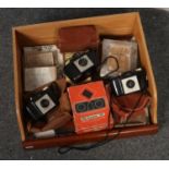 A collection of photographic equipment, Bi-Lens 35 mm slide viewer, Kodak Brownie 127 cameras,