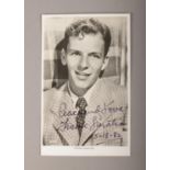 A signed and dated monochrome postcard of Frank Sinatra.