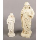 Two vintage religious plaster figures including Christ with sacred heart.