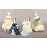 Five Royal Doulton figures of ladies and girls; HN2379, HN2385, HN3889, HN3393 and HN2312. Chip to