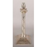 A silver plate ornate table lamp base of Corinthian column form.