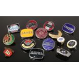 Fourteen vintage enameled motorcycle badges. Norton, Triumph and Greeves etc.
