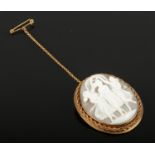 A 9ct gold cameo brooch decorated with 3 maidens.
