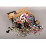 A box of costume jewellery to include beads, bangles, necklaces, earrings etc.