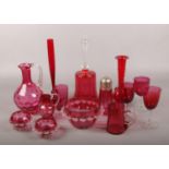 A collection of coloured glass, mainly cranberry, to include Victorian examples Chips to some
