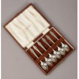 A cased set of six silver demitasse spoons by Cooper Brothers & Sons Ltd. Assayed Sheffield 1953, 49