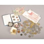 A collection of foreign coins and notes Krone, Cent, to include antique example, foreign stamps,