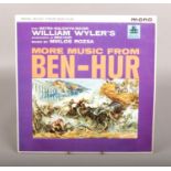 An LP record More Music From Ben-Hur, autographed by actor Charlton Heston.