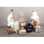 A collection of oriental ceramics and glass, to include vases, figure, ginger jar etc.