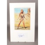 An autographed Raquel Welch One Million Years BC display.
