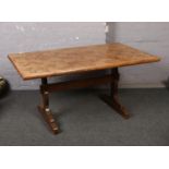 An oak refectory dining table with parquetry inlaid top, 150cm x 91cm. Top needs restoration.