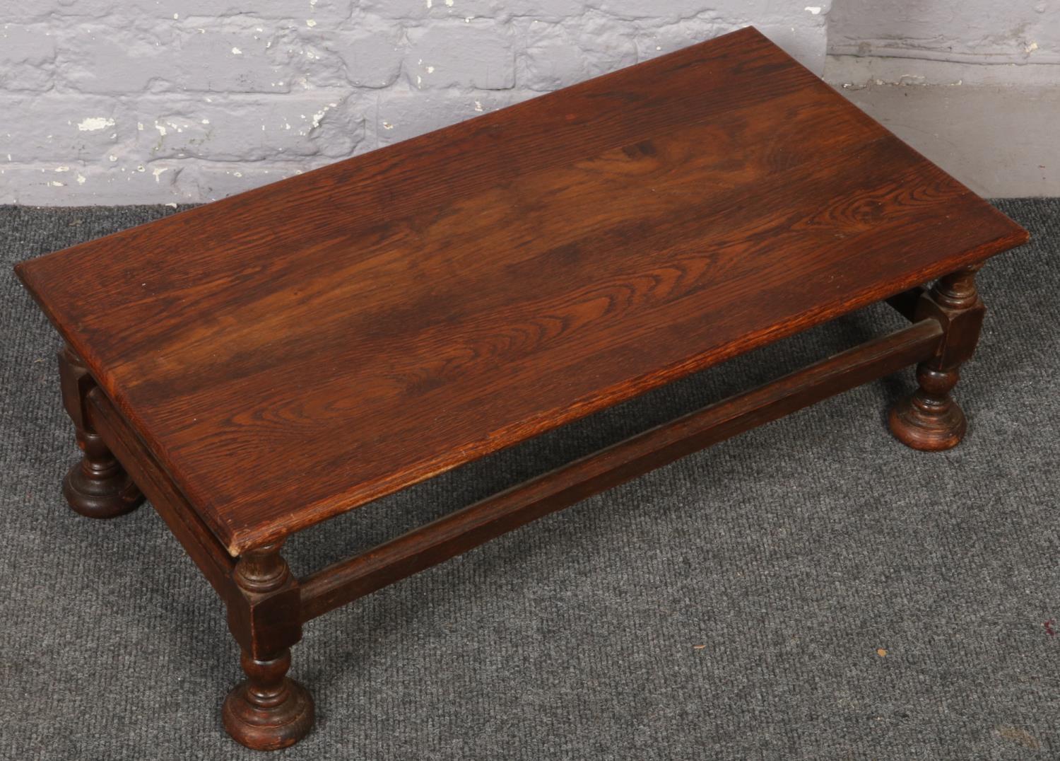 A mahogany low coffee table. 80cm x 25cm x 41cm.