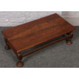 A mahogany low coffee table. 80cm x 25cm x 41cm.