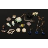 A box of good quality vintage dress jewellery including a cruciform jet brooch and a Scottish