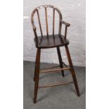 A Vintage child's wooden highchair (approx 82cm height 30 cm wide)