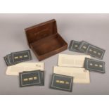 A boxed set of franklin mint silver gilt official flags of all nation miniatures.