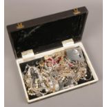 A box of necklaces to include silver examples.