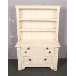 A white painted child's Welsh dresser.
