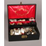 A collection of costume jewellery, mainly earrings, to include jewellery box