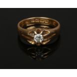 A gentleman's George V 18ct gold signet ring set with a solitaire diamond. Assayed Birmingham
