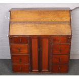 A large 1940s oak bureau.