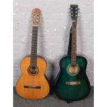Two acoustic guitars to include Westville and Cortez examples.
