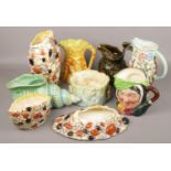 A collection of ceramics to include Royal Doulton character jug, Sylvac pebble vases and jugs etc.