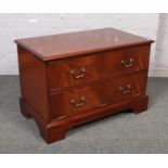 An Archer & Smith mahogany TV stand of chest form.
