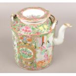 A Cantonese ceramic teapot, decorated with flowers, birds and figures. Gilt wear to spout. Minor