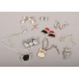 A small box of dress jewellery including owl themed pieces and named designer examples.